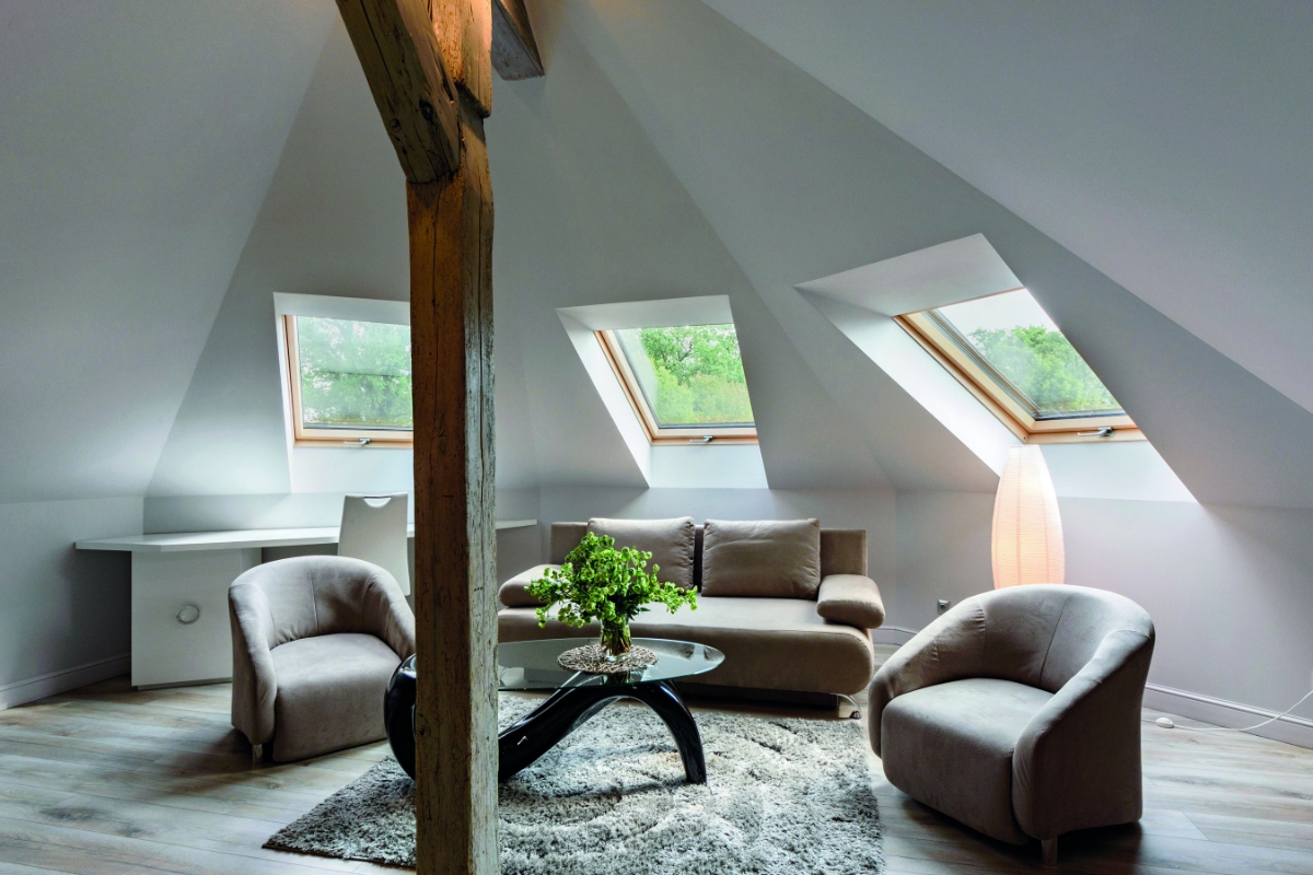 room with centre pivot roof windows