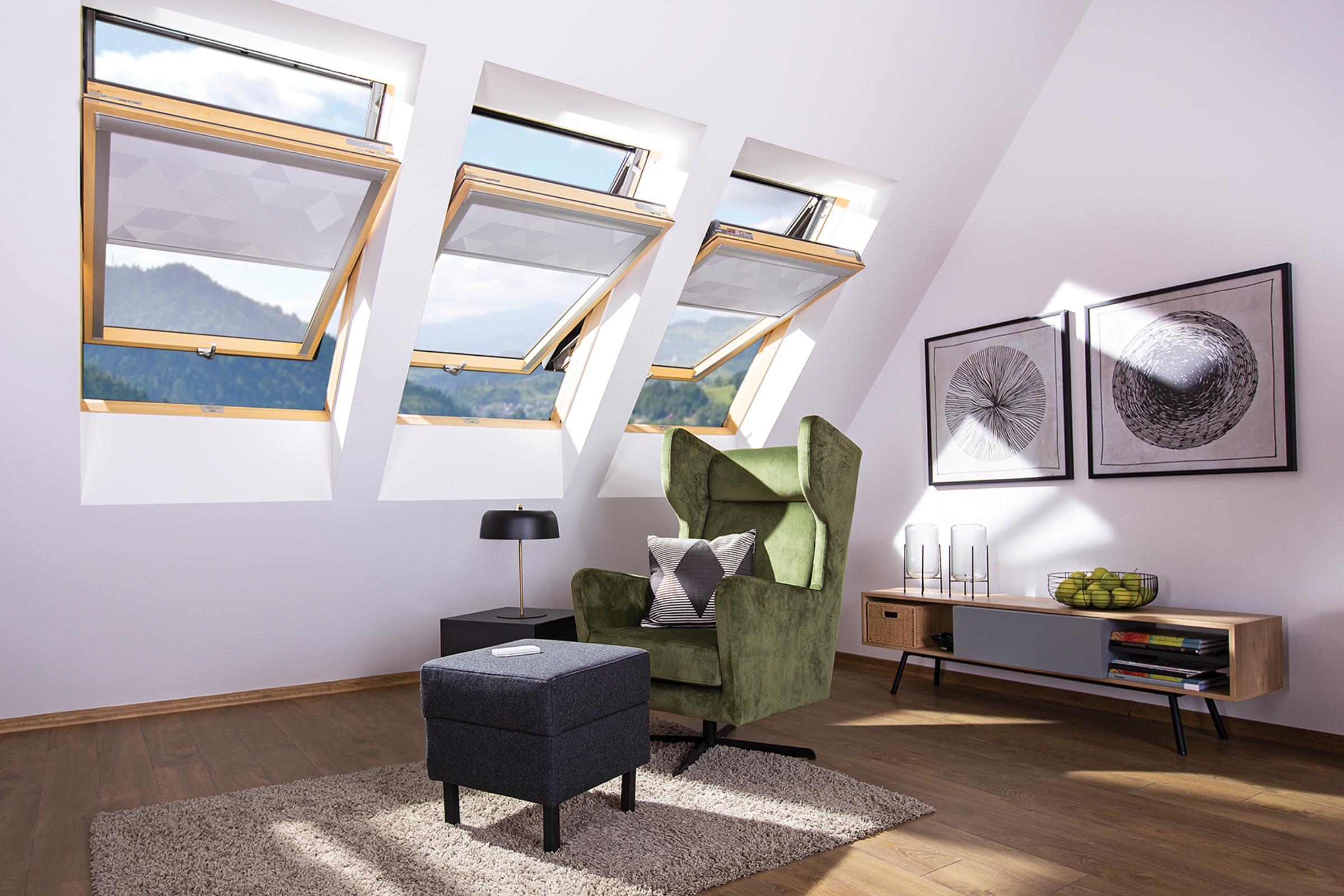 room with centre pivot roof windows